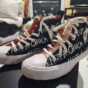 Converse Black and White High-Top Sneakers